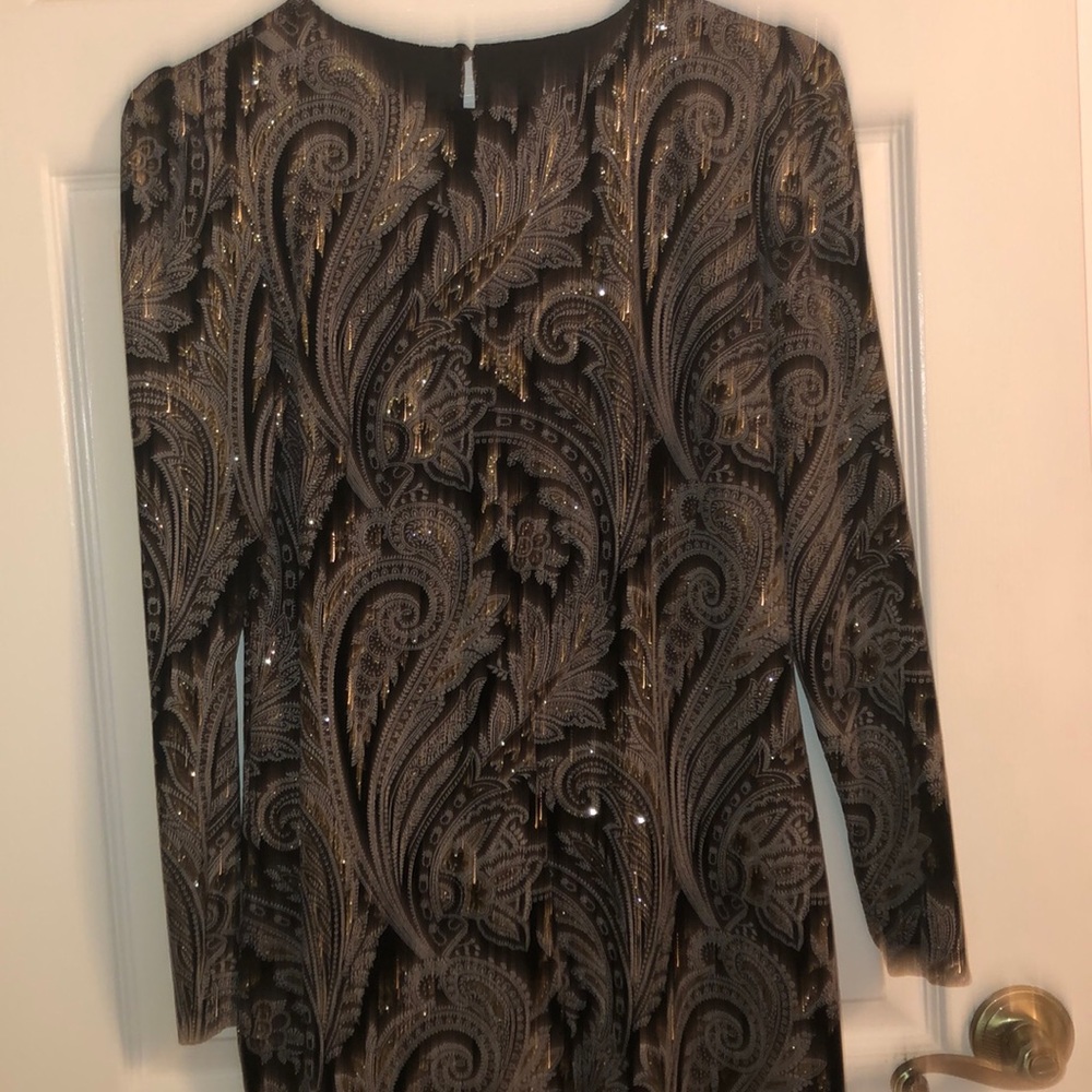 Gold and black velvet dress. Knee length, has a little bit if stretch to it.